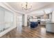 Bright kitchen with stainless steel appliances, gray cabinets, and a dark blue island at 1403 Graystone Canyon Ave, Las Vegas, NV 89183