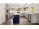 Gorgeous kitchen with gray cabinets, stainless appliances, and a dark blue island at 1403 Graystone Canyon Ave, Las Vegas, NV 89183