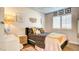 Charming bedroom with a bed and artistic wall decor at 1513 Ravanusa Dr, Henderson, NV 89052
