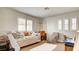 Stylish bedroom featuring a daybed, desk, and ample natural light at 1513 Ravanusa Dr, Henderson, NV 89052