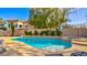 Inviting backyard pool and spa, perfect for relaxation and entertaining in a private outdoor setting at 1513 Ravanusa Dr, Henderson, NV 89052