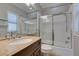 Bathroom with a tiled shower/tub combination and dark vanity at 1813 Francisco Peak Pl, Las Vegas, NV 89128
