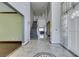 Grand entryway with marble floors, a staircase, and a view into the living room creating a lasting first impression at 1813 Francisco Peak Pl, Las Vegas, NV 89128