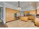 Bright kitchen with custom cabinets, stainless steel appliances, an island, and granite countertops at 1813 Francisco Peak Pl, Las Vegas, NV 89128