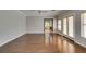 Bright living room with hardwood floors, neutral paint, and access to the backyard at 1813 Francisco Peak Pl, Las Vegas, NV 89128