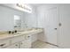 Bathroom featuring a wide mirror, marble countertop, and tile floor at 1857 Arbol Verde Way, Las Vegas, NV 89119