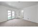 Spacious bedroom with access to both a patio and an en-suite bathroom at 1857 Arbol Verde Way, Las Vegas, NV 89119