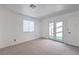 Carpeted bedroom includes access to outdoor patio at 1857 Arbol Verde Way, Las Vegas, NV 89119