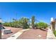 Well-maintained tennis court, lined with lush greenery, offering recreational opportunities for residents at 1857 Arbol Verde Way, Las Vegas, NV 89119