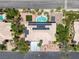 Aerial view of the home showcasing a sparkling pool, patio, and solar panels on the roof at 2209 Purple Majesty Ct, Las Vegas, NV 89117
