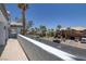 Balcony with views of the street, palm trees, and neighborhood homes at 2209 Purple Majesty Ct, Las Vegas, NV 89117