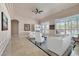 Spacious living room showcasing plantation shutters, neutral tones, and bright natural light at 2209 Purple Majesty Ct, Las Vegas, NV 89117