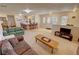 Spacious living room with open floor plan and views of the kitchen and front entry at 3110 National Ave, Pahrump, NV 89048