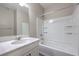 Bathroom with a single vanity, large mirror, and a shower and tub combination at 3164 Bormida Ave, Henderson, NV 89044
