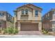 Charming two-story home with a paver driveway, a two-car garage, and a well-maintained front yard at 3164 Bormida Ave, Henderson, NV 89044