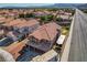 Overhead view of the house with a backyard pool, patio, and a well-maintained lawn at 3937 Country Lights St, Las Vegas, NV 89129