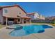 Private backyard with a pool, spa, and covered patio for outdoor entertaining at 3937 Country Lights St, Las Vegas, NV 89129