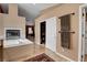 Bathroom showcasing a walk-in shower and closet next to a tub and fireplace at 3937 Country Lights St, Las Vegas, NV 89129
