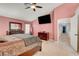 Spacious bedroom boasting a ceiling fan and natural light at 3937 Country Lights St, Las Vegas, NV 89129