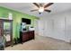 Bright bedroom with neutral carpet, ceiling fan and closet perfect for additional storage at 3937 Country Lights St, Las Vegas, NV 89129