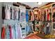 Walk-in closet with extensive shelving and hanging racks to maximize storage space at 3937 Country Lights St, Las Vegas, NV 89129
