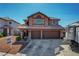 Charming two-story home with a well-maintained lawn and a convenient two-car garage at 3937 Country Lights St, Las Vegas, NV 89129