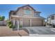 Charming two-story home with tile roof and spacious two-car garage at 3937 Country Lights St, Las Vegas, NV 89129