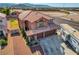 The beautiful home features a three-car garage, mature landscaping, RV parking, and convenient access to nearby amenities at 3937 Country Lights St, Las Vegas, NV 89129