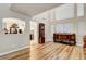 Open-concept foyer with hardwood floors and plenty of natural light at 3937 Country Lights St, Las Vegas, NV 89129