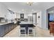 Beautiful kitchen with a large kitchen island and stainless steel appliances at 3937 Country Lights St, Las Vegas, NV 89129