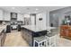 Kitchen features a central island, stainless appliances and modern finishes at 3937 Country Lights St, Las Vegas, NV 89129