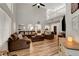Bright living room with high ceilings and wood laminate flooring at 3937 Country Lights St, Las Vegas, NV 89129