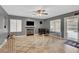 Cozy living room area with a play area and backyard access at 3937 Country Lights St, Las Vegas, NV 89129