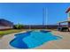 Inviting backyard pool and spa with clear blue water, perfect for relaxing and entertaining at 3937 Country Lights St, Las Vegas, NV 89129