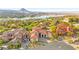 Stunning aerial view of the luxurious neighborhood surrounded by desert and a lake at 4 Via Vittorio Pl, Henderson, NV 89011