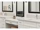Spa-like bathroom featuring dual sinks, a vanity area, and modern fixtures at 4 Via Vittorio Pl, Henderson, NV 89011