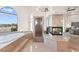 Bright bathroom with a fireplace, bathtub, and walk-in shower at 4 Via Vittorio Pl, Henderson, NV 89011