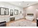 Modern bathroom with dual vanities, soaking tub, fireplace and accent wall at 4 Via Vittorio Pl, Henderson, NV 89011