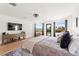 Spacious bedroom with stunning mountain views, an entertainment center, and designer touches at 4 Via Vittorio Pl, Henderson, NV 89011