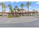 Circular entrance to the club house with well manicured landscaping and ample parking at 4 Via Vittorio Pl, Henderson, NV 89011