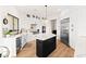 Bright kitchen with large island, stainless appliances, and open layout at 4 Via Vittorio Pl, Henderson, NV 89011