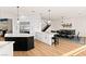 Bright kitchen with large island, stainless appliances, and a dining area nearby at 4 Via Vittorio Pl, Henderson, NV 89011