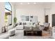 Bright living room featuring modern decor, hardwood floors, and an elegant seating arrangement at 4 Via Vittorio Pl, Henderson, NV 89011