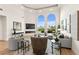 Bright and airy living room boasts high ceilings, large windows, and stylish, comfortable furnishings at 4 Via Vittorio Pl, Henderson, NV 89011