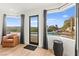 Stylish sitting area with a pool and views of mountains in the background at 4 Via Vittorio Pl, Henderson, NV 89011