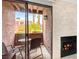Cozy balcony showcasing outdoor seating and a fireplace, perfect for relaxing or entertaining at 4050 Pacific Harbors Dr # 127, Las Vegas, NV 89121