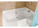 Bathroom featuring a clean bathtub perfect for a relaxing soak at 4050 Pacific Harbors Dr # 127, Las Vegas, NV 89121