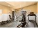 Community gym featuring modern exercise equipment and a doorway to the pool at 4050 Pacific Harbors Dr # 127, Las Vegas, NV 89121