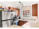 Well-appointed kitchen with stainless steel appliances, granite countertops, and ample cabinet space at 4050 Pacific Harbors Dr # 127, Las Vegas, NV 89121