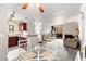 Open-concept design of the living room, dining area and kitchen allows for seamless entertaining and Gathering time at 4050 Pacific Harbors Dr # 127, Las Vegas, NV 89121